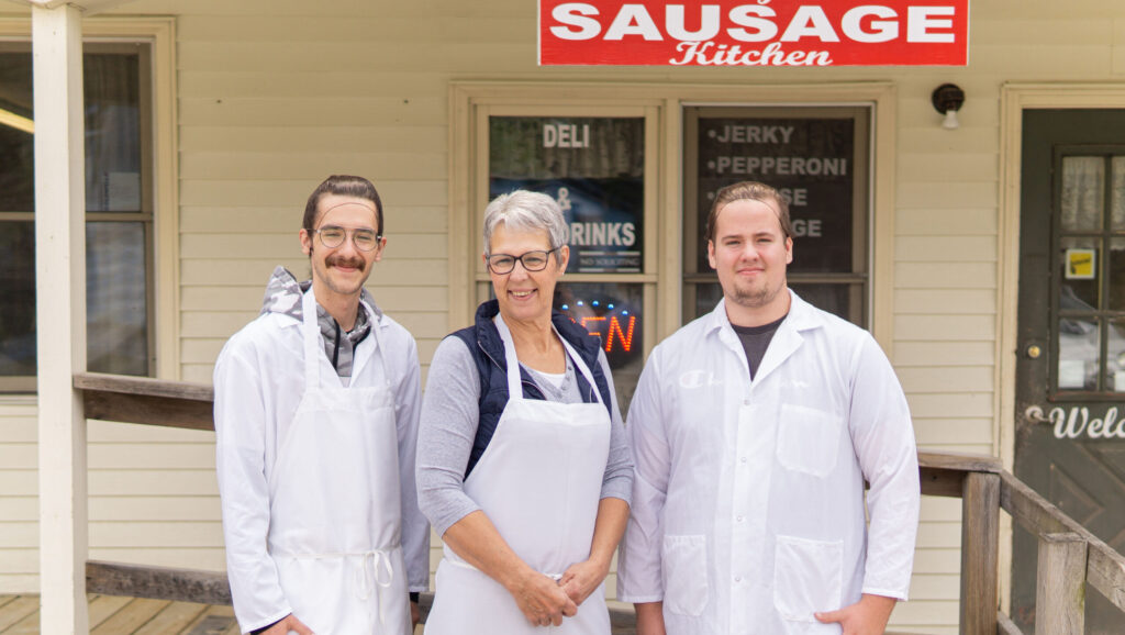 Evelyn, the original founder of Evelyn's Sausage Kitchen alongside the Harris brothers. Evelyn mentored the Harris boys by teaching them her recipes and techniques to carry on the great product offerings that customers have come to expect when they visit the shop.